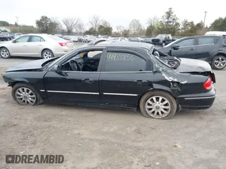 2004 Hyundai Sonata GLS with VIN KMHWF35HX4A068682, listed as a IAAI auction lot 41933856 with 127,508 mi miles. Bid and sale history available at carsss.com. Image 15.