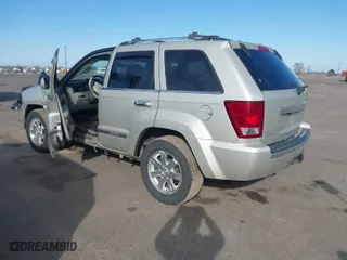 2010 Jeep Grand Cherokee Limited with VIN 1J4RR5GT0AC150324, listed as a IAAI auction lot 41814862 with 175,468 mi miles. Bid and sale history available at carsss.com. Image 3.