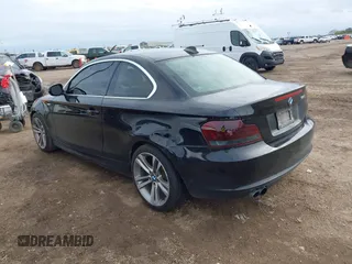 2013 BMW 1 Series 128i with VIN WBAUP7C52DVP24985, listed as a IAAI auction lot 41368682 with 107,294 mi miles and . Bid and sale history available at carsss.com. Image 3.