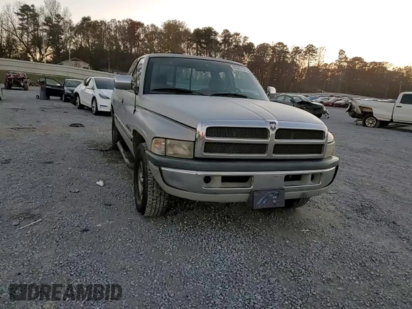 1996 Dodge 1500 z VIN 3B7HC13Y8TG197971, wystawiony jako Copart lot #82565154 z przebiegiem 248 833 mil mil oraz Szkoda całkowita • Salvage title. Historia ofert i sprzedaży dostępna na DreamBid. Obrazek 10.
