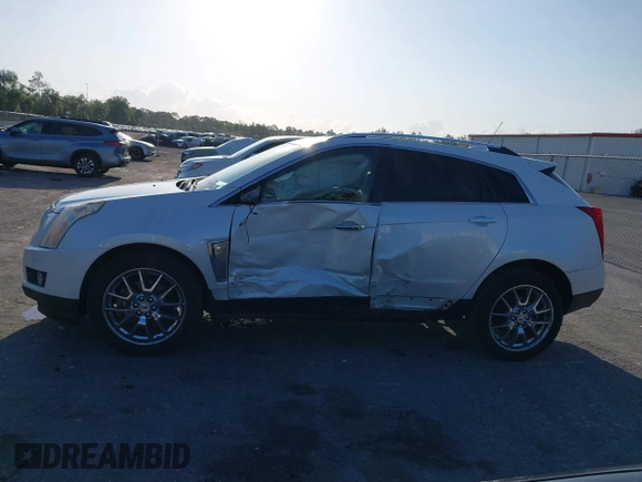2015 Cadillac SRX Premium Collection with VIN 3GYFNDE32FS530357, listed as a IAAI auction lot 41976585 with 92,335 mi miles and . Bid and sale history available at carsss.com. Image 14.