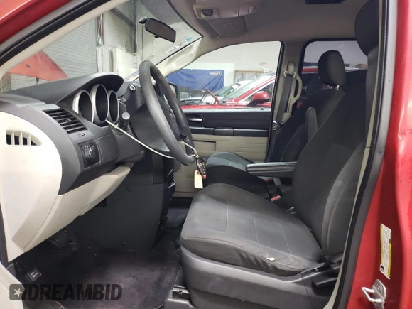 2008 Dodge Grand Caravan SE with VIN 1D8HN44H48B122356, listed as a Copart auction lot 85384614 with 130,229 mi miles and Salvage Title. Bid and sale history available at DreamBid. Image 7.