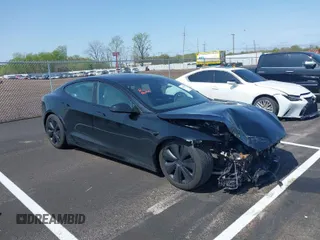 2022 Tesla Model S with VIN 5YJSA1E56NF490064, listed as a IAAI auction lot 41858477 with Not Provided miles and . Bid and sale history available at DreamBid. Image 1.