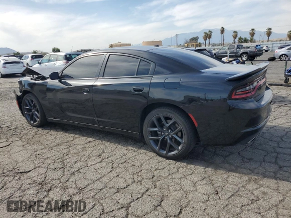 2021 Dodge Charger SXT with VIN 2C3CDXBG9MH682354, listed as a Copart auction lot 48586415 with 112,449 mi miles and Salvage Title. Bid and sale history available at carsss.com. Image 2.
