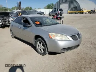 2006 Pontiac G6 1SV z VIN 1G2ZF55B164196954, wystawiony jako Copart lot #52812255 z przebiegiem Nie podano mil oraz Szkoda całkowita • Salvage title. Historia ofert i sprzedaży dostępna na DreamBid. Obrazek 11.