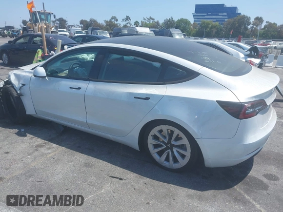 2023 Tesla Model 3 with VIN 5YJ3E1EA6PF460054, listed as a IAAI auction lot 41231368 with 29,437 mi miles and . Bid and sale history available at DreamBid. Image 3.