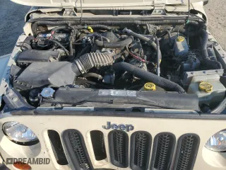 2011 Jeep Wrangler Unlimited Sahara with VIN 1J4BA5H10BL558961, listed as a Copart auction lot 74806494 with 172,855 mi miles and Salvage Title. Bid and sale history available at carsss.com. Image 13.