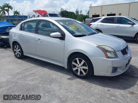 2012 Nissan Sentra S z VIN 3N1AB6AP7CL657434, wystawiony jako IAAI lot #42728376 z przebiegiem 150 930 mil mil oraz . Historia ofert i sprzedaży dostępna na DreamBid. Obrazek 1.