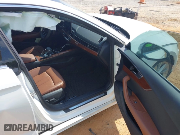 2023 Audi A5 Sportback Premium z VIN WAUABCF57PA020461, wystawiony jako IAAI lot #42230307 z przebiegiem 28 983 mil mil oraz . Historia ofert i sprzedaży dostępna na DreamBid. Obrazek 5.