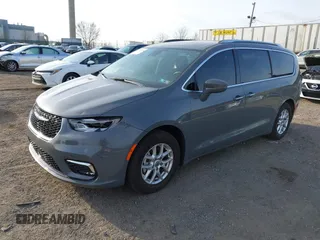 2021 Chrysler Pacifica Touring L with VIN 2C4RC1BG4MR598328, listed as a IAAI auction lot 41749306 with 78,035 mi miles and . Bid and sale history available at DreamBid. Image 2.