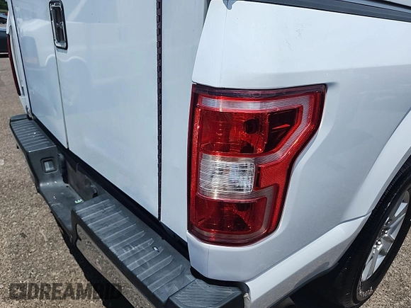 2020 Ford F-150 with VIN 1FTFX1C49LKD53369, listed as a IAAI auction lot 42725370 with 187,970 mi miles and . Bid and sale history available at DreamBid. Image 20.