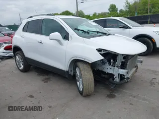 2020 Chevrolet Trax Premier with VIN 3GNCJRSB0LL196680, listed as a IAAI auction lot 42346668 with 52,713 mi miles and . Bid and sale history available at DreamBid. Image 1.