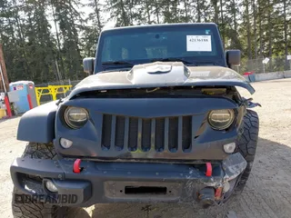 2015 Jeep Wrangler Unlimited Willys Wheeler with VIN 1C4BJWDG9FL750049, listed as a IAAI auction lot 42136188 with 115,328 mi miles and . Bid and sale history available at DreamBid. Image 13.
