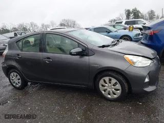 2013 Toyota Prius c One with VIN JTDKDTB32D1548295, listed as a IAAI auction lot 41768516 with 104,708 mi miles. Bid and sale history available at carsss.com. Image 13.
