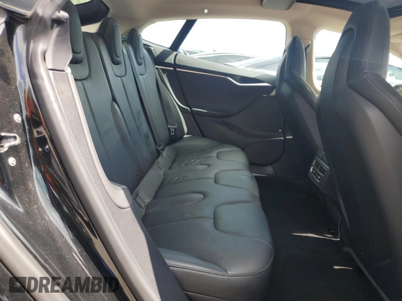 2013 Tesla Model S with VIN 5YJSA1CN8DFP06126, listed as a Copart auction lot 63098515 with 47,215 mi miles and Clean title. Bid and sale history available at DreamBid. Image 10.