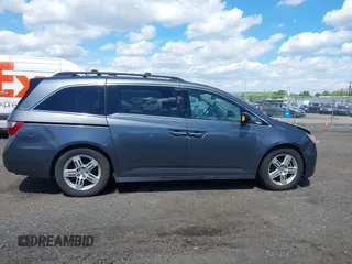 2011 Honda Odyssey Touring Elite with VIN 5FNRL5H96BB043339, listed as a IAAI auction lot 42174767 with 161,233 mi miles and . Bid and sale history available at DreamBid. Image 13.
