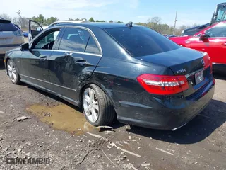 2012 Mercedes-Benz E-Class E 350 Luxury with VIN WDDHF8JB0CA614034, listed as a IAAI auction lot 42036672 with 65,049 mi miles. Bid and sale history available at carsss.com. Image 3.