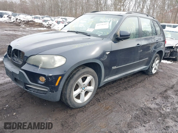 2008 BMW X5 3.0si with VIN 5UXFE43548L004975, listed as a IAAI auction lot 41563255 with 999,999 mi miles. Bid and sale history available at carsss.com. Image 2.
