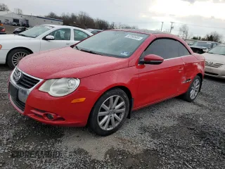 2011 Volkswagen Eos Komfort с VIN WVWBA7AH3BV000308, выставлен на аукционе Copart как лот 82363404 с пробегом 135 465 миль миль и Списание • Salvage title. История ставок и продаж доступна на DreamBid. Изображение 1.