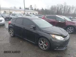2014 Ford Focus ST with VIN 1FADP3L94EL180667, listed as a IAAI auction lot 41718746 with 141,574 mi miles and . Bid and sale history available at carsss.com. Image 1.