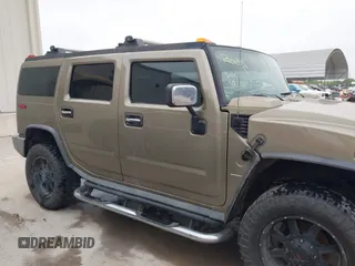 2005 Hummer H2 SUV z VIN 5GRGN23U95H132238, wystawiony jako IAAI lot #41809909 z przebiegiem 300 293 mil mil oraz . Historia ofert i sprzedaży dostępna na DreamBid. Obrazek 13.