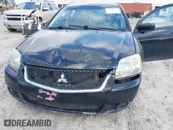 2011 Mitsubishi Galant FE z VIN 4A32B2FF9BE028621, wystawiony jako IAAI lot #41788773 z przebiegiem 261 300 mil mil oraz . Historia ofert i sprzedaży dostępna na DreamBid. Obrazek 6.