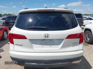 2017 Honda Pilot Touring with VIN 5FNYF6H92HB054145, listed as a IAAI auction lot 42200391 with 70,096 mi miles and . Bid and sale history available at DreamBid. Image 16.