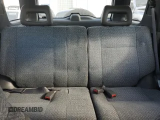 1999 Isuzu Rodeo S with VIN 4S2CK58W7X4357230, listed as a Copart auction lot 85214894 with 130,370 mi miles and Salvage title. Bid and sale history available at DreamBid. Image 10.
