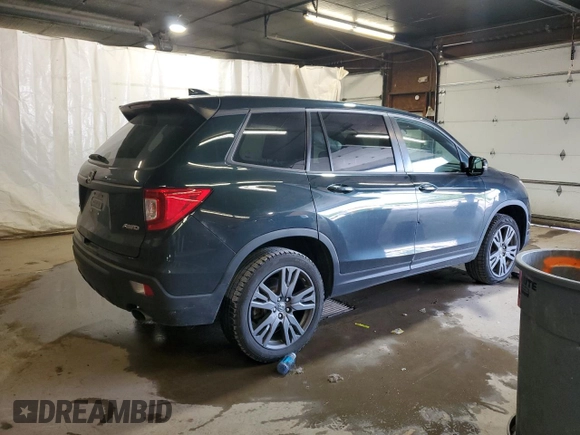 2020 Honda Passport EX-L with VIN 5FNYF8H57LB011549, listed as a Copart auction lot 59123735 with 127,797 mi miles and Salvage title. Bid and sale history available at DreamBid. Image 3.