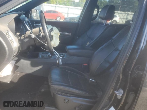 2014 Dodge Durango R/T with VIN 1C4SDJCT9EC596160, listed as a Copart auction lot 58034505 with 140,674 mi miles and Salvage title. Bid and sale history available at DreamBid. Image 7.
