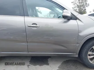 2013 Kia Sorento SX z VIN 5XYKW4A23DG400942, wystawiony jako IAAI lot #42185267 z przebiegiem 162 209 mil mil oraz . Historia ofert i sprzedaży dostępna na DreamBid. Obrazek 6.