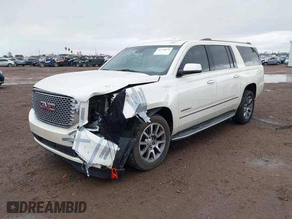 2015 GMC Yukon XL Denali with VIN 1GKS2JKJ2FR590502, listed as a IAAI auction lot 41758575 with 129,777 mi miles. Bid and sale history available at carsss.com. Image 16.