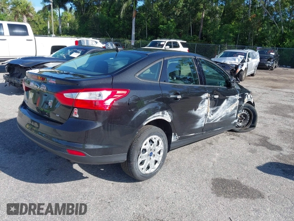 2012 Ford Focus SE with VIN 1FAHP3F22CL150631, listed as a IAAI auction lot 42594823 with 49,456 mi miles and . Bid and sale history available at DreamBid. Image 4.