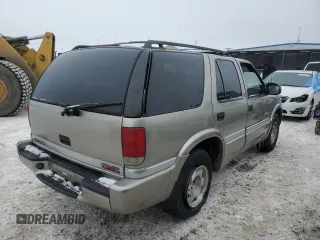 2000 GMC Jimmy SL with VIN 1GKCS13W7Y2187710, listed as a Copart auction lot 45894215 with 179,237 mi miles and Salvage Title. Bid and sale history available at carsss.com. Image 3.