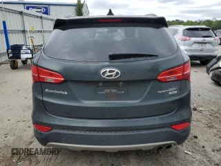 2013 Hyundai Santa Fe Sport z VIN 5XYZUDLAXDG082486, wystawiony jako Copart lot #68941974 z przebiegiem Nie podano mil oraz Szkoda całkowita • Salvage title. Historia ofert i sprzedaży dostępna na DreamBid. Obrazek 6.