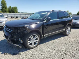 2013 Volkswagen Touareg Lux with VIN WVGEF9BP0DD001565, listed as a Copart auction lot 63070845 with 123,788 mi miles and Salvage title. Bid and sale history available at DreamBid. Image 1.