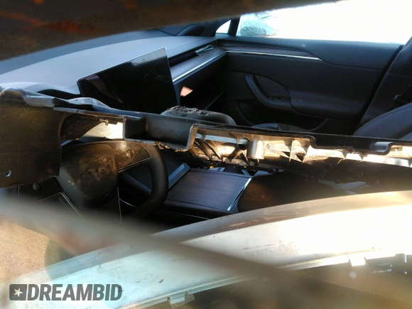 2022 Tesla Model S with VIN 5YJSA1E54NF488023, listed as a IAAI auction lot 36074023 with 200 mi miles and . Bid and sale history available at DreamBid. Image 7.