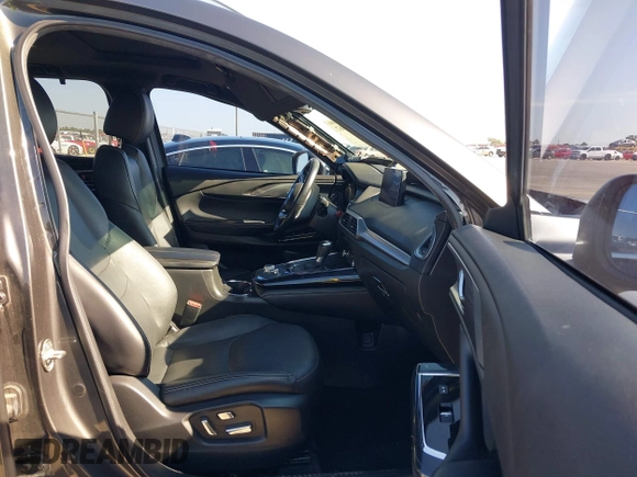 2020 Mazda CX-9 Grand Touring with VIN JM3TCADY1L0417651, listed as a IAAI auction lot 42334867 with 105,236 mi miles and . Bid and sale history available at DreamBid. Image 5.