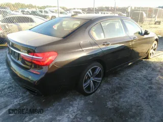 2017 BMW 7 Series 750i with VIN WBA7F0C35HGM22087, listed as a IAAI auction lot 40872348 with 49,734 mi miles. Bid and sale history available at carsss.com. Image 4.