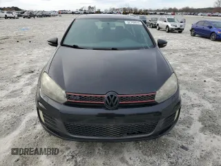 2012 Volkswagen GTI z VIN WVWHV7AJ3CW014643, wystawiony jako Copart lot #82768644 z przebiegiem 125 403 mil mil oraz Czysty tytuł • Clean title. Historia ofert i sprzedaży dostępna na DreamBid. Obrazek 5.