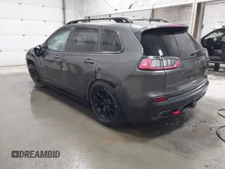 2022 Jeep Cherokee Trailhawk z VIN 1C4PJMBX9ND514703, wystawiony jako IAAI lot #41761037 z przebiegiem 38 499 mil mil oraz . Historia ofert i sprzedaży dostępna na DreamBid. Obrazek 3.