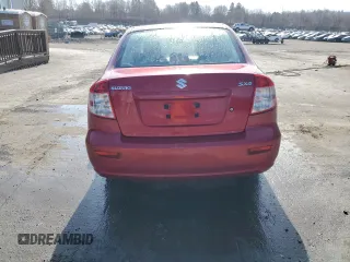 2012 Suzuki SX4 LE z VIN JS2YC5A34C6300969, wystawiony jako Copart lot #49036095 z przebiegiem 163 367 mil mil oraz Szkoda całkowita • Salvage title. Historia ofert i sprzedaży dostępna na DreamBid. Obrazek 6.