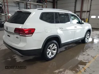 2018 Volkswagen Atlas SE with VIN 1V2KR2CA2JC569381, listed as a IAAI auction lot 41843200 with 87,769 mi miles and . Bid and sale history available at DreamBid. Image 4.