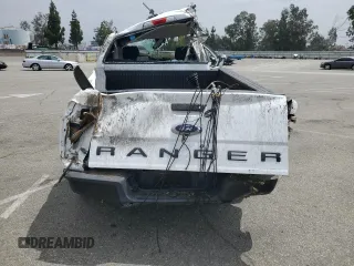 2021 Ford Ranger XL z VIN 1FTER4FH9MLE03687, wystawiony jako Copart lot #59232715 z przebiegiem Nie podano mil oraz Szkoda całkowita • Salvage title. Historia ofert i sprzedaży dostępna na DreamBid. Obrazek 6.