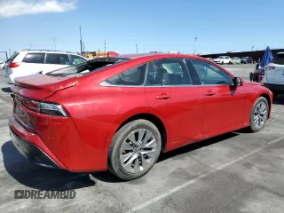2021 Toyota Mirai XLE with VIN JTDAAAAA2MA003464, listed as a Copart auction lot 57154465 with 23,289 mi miles and Salvage title. Bid and sale history available at DreamBid. Image 3.