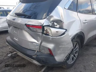 2020 Ford Escape SEL z VIN 1FMCU9H66LUA64860, wystawiony jako IAAI lot #41947561 z przebiegiem 50 703 mil mil oraz . Historia ofert i sprzedaży dostępna na DreamBid. Obrazek 6.