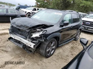 2019 Honda Passport Touring z VIN 5FNYF7H96KB000201, wystawiony jako Copart lot #73759134 z przebiegiem Nie podano mil oraz Szkody całkowita. Historia ofert i sprzedaży dostępna na DreamBid. Obrazek 1.