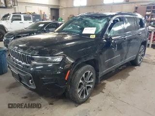 2021 Jeep Grand Cherokee Overland with VIN 1C4RJKDG8M8164904, listed as a IAAI auction lot 41352092 with 57,707 mi miles and . Bid and sale history available at DreamBid. Image 17.