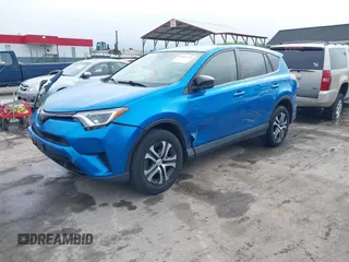 2018 Toyota RAV4 LE with VIN JTMBFREV8JJ220630, listed as a IAAI auction lot 42001795 with 86,027 mi miles. Bid and sale history available at carsss.com. Image 20.