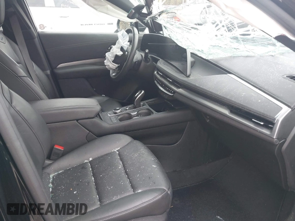 2024 Cadillac XT4 AWD Premium Luxury с VIN 1GYFZDR44RF147956, выставлен на аукционе IAAI как лот 42434595 с пробегом 26 328 миль миль и . История ставок и продаж доступна на DreamBid. Изображение 5.